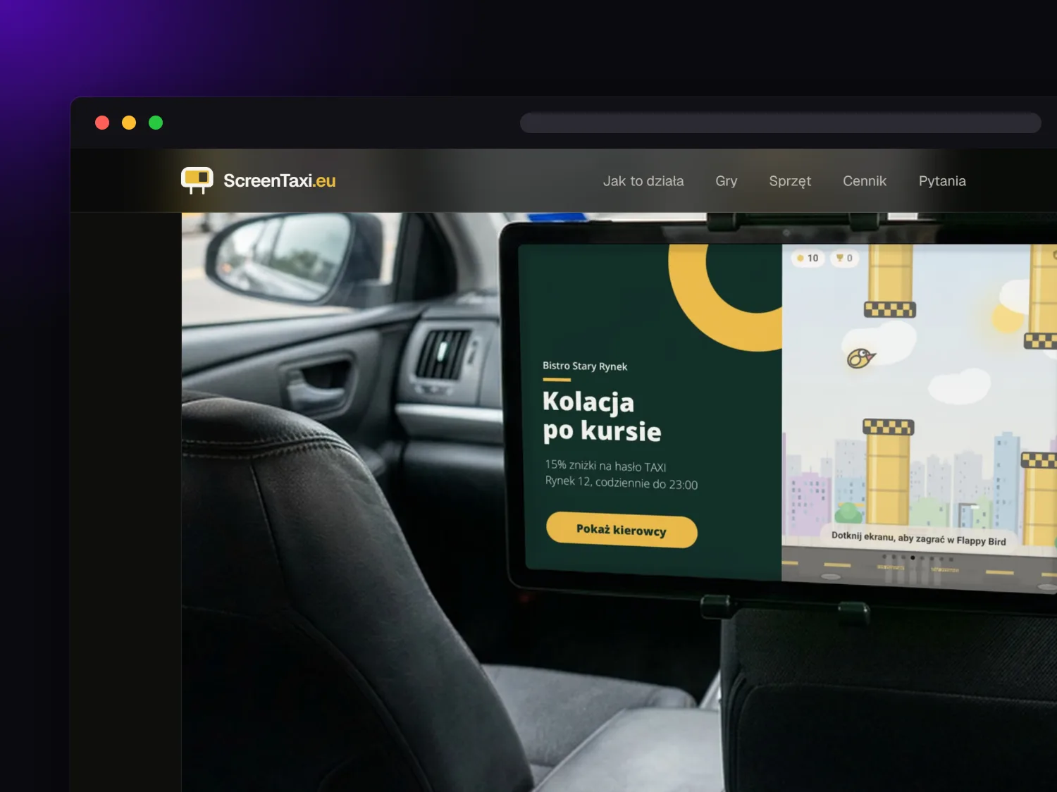 Tablet ScreenTaxi z reklamą i grą przy zagłówku taksówki